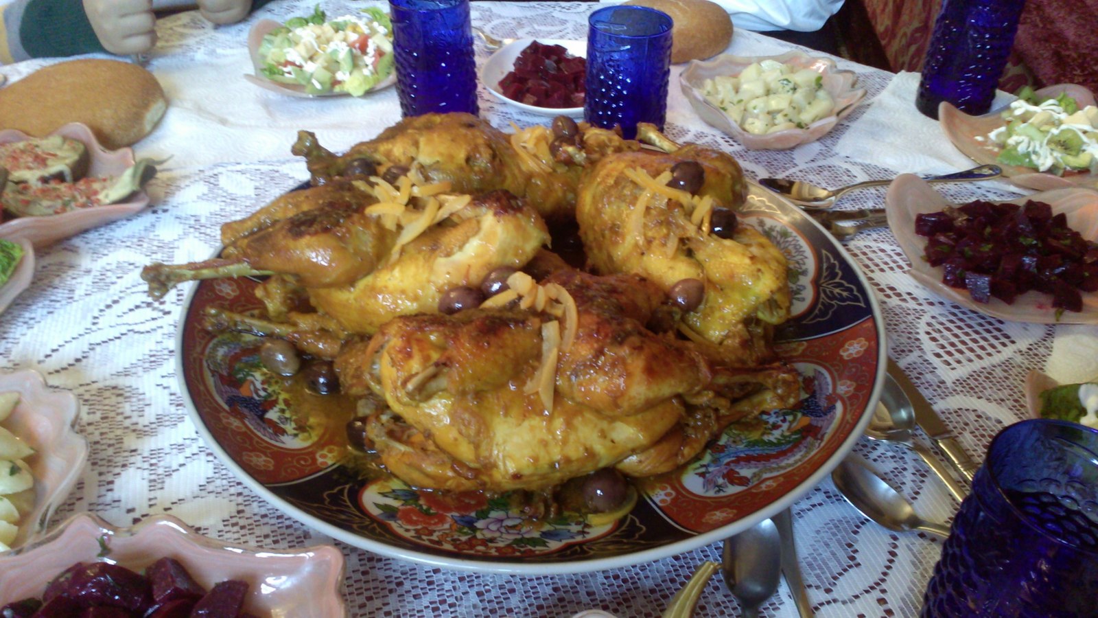 A traditional Moroccan tagine served with olives and preserved lemon